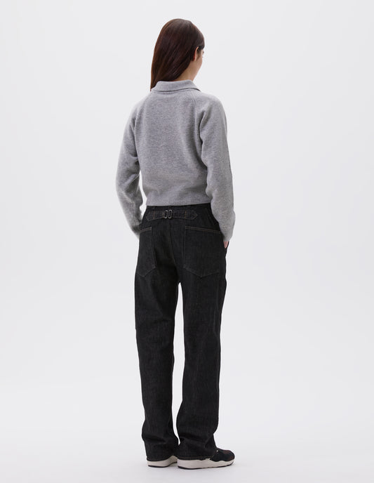 Full body image, back view of model wearing grey cropped collared jumper with contrast rib on cuffs and hem. Styled with black jeans with cinch back and black, brown and white trainers.