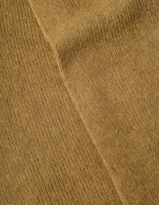 Yellow knitted wool scarf, fabric swatch.