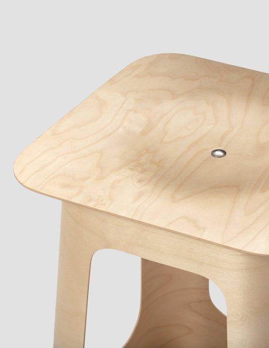 Close up detail of the seat of the Isokon stool.