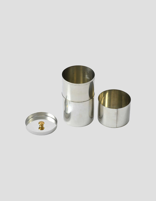 A shiny new tin long tea caddy showing both inner and outer lids removed to see the tinplate inner structure.