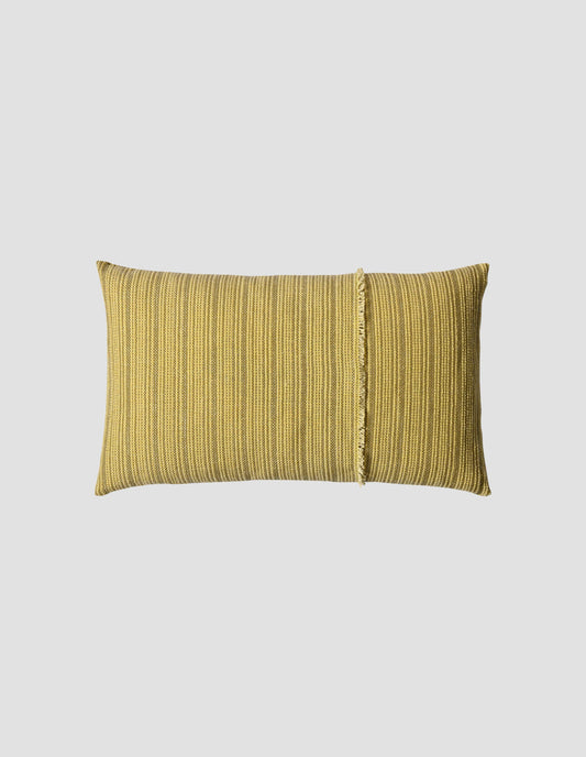 A flat lay view of the handloomed mustard cushion showing the warp thread selvedge at the opening for the cushion pad.