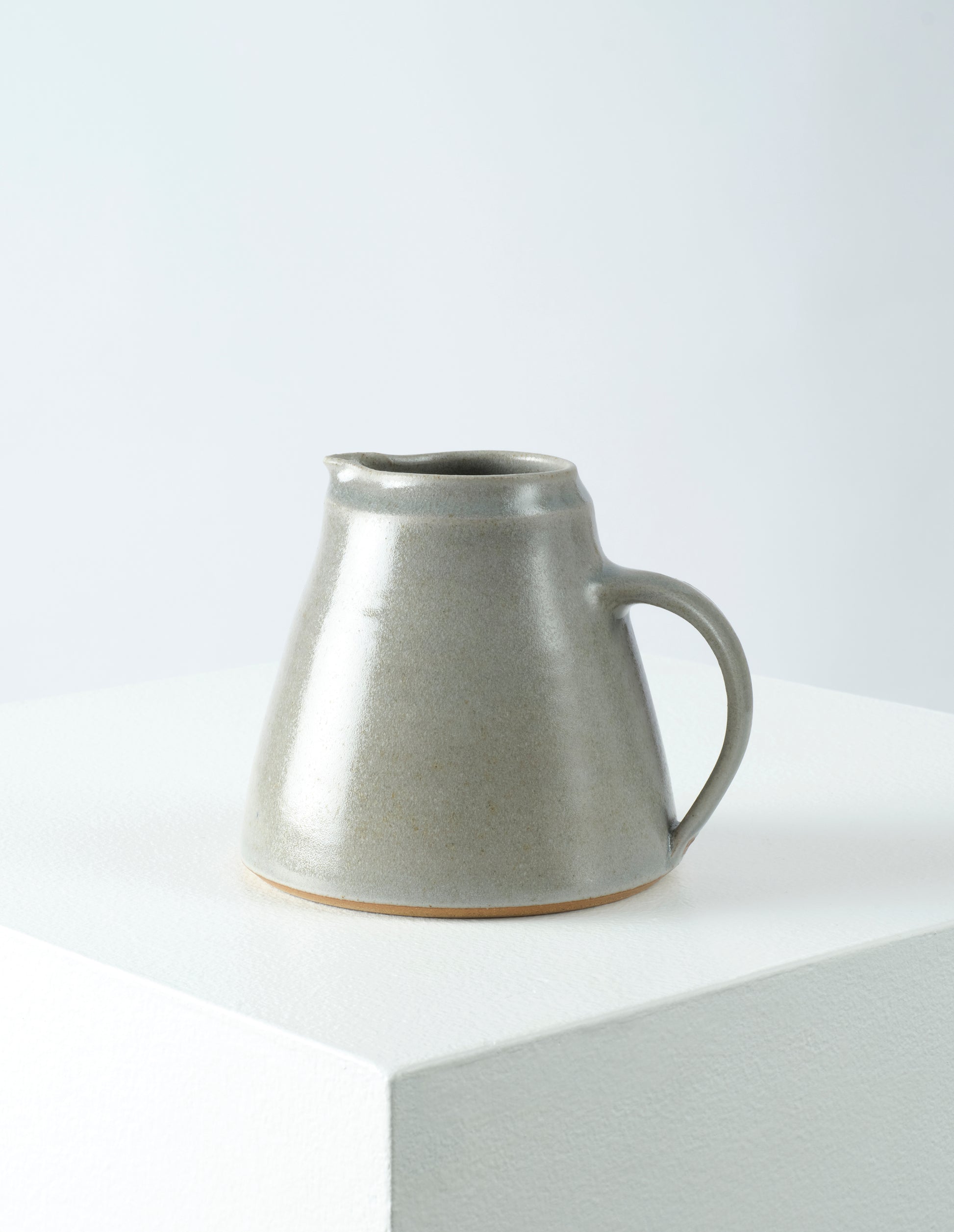 Front view of Nicola Tassie small ash grey glazed stoneware jug.