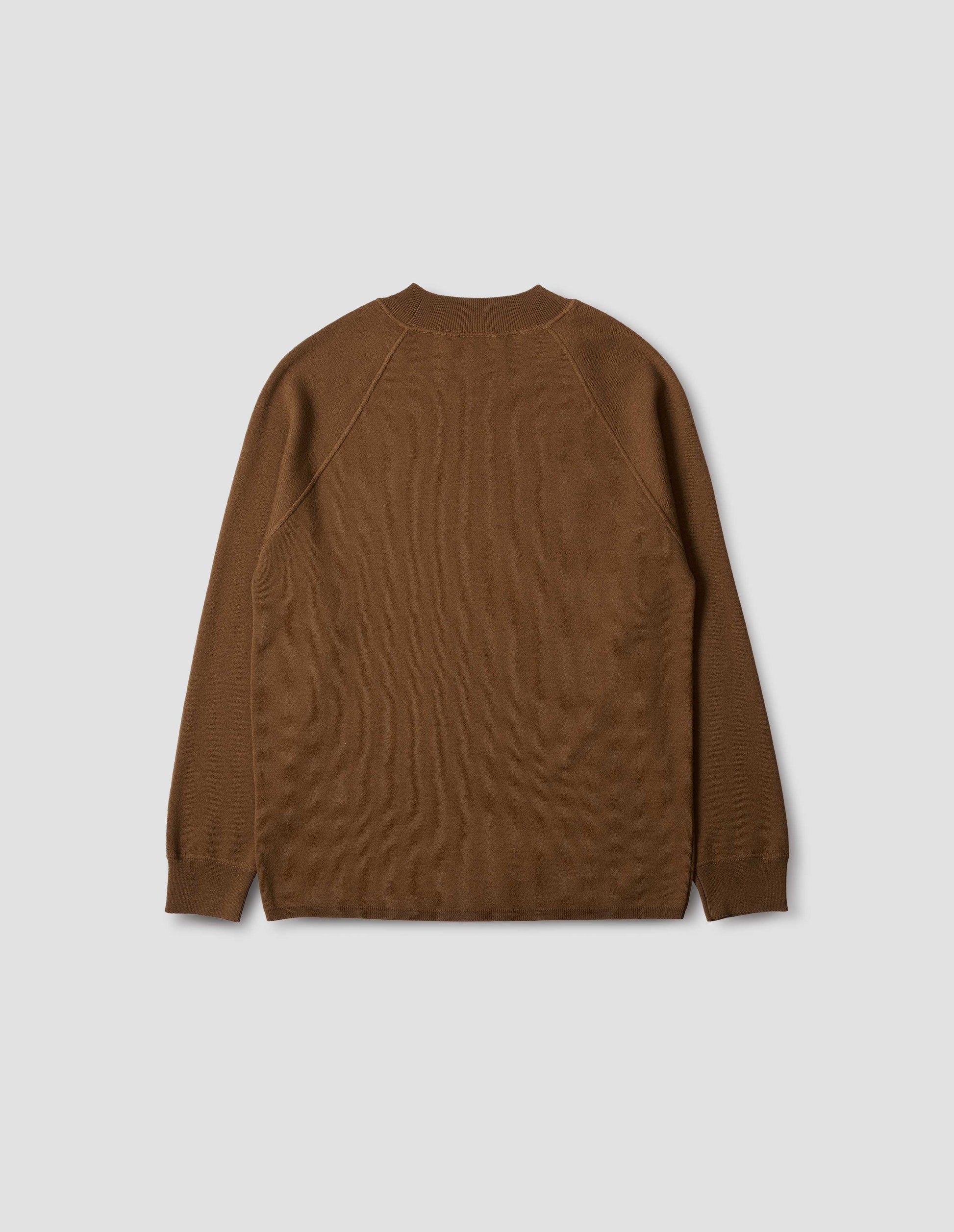 Brown merino wool wide neck sweatshirt, with raglan sleeve, flatlock stitch detailing on seams and contrasting rib on neck, cuffs and hem. Back flat lay view.