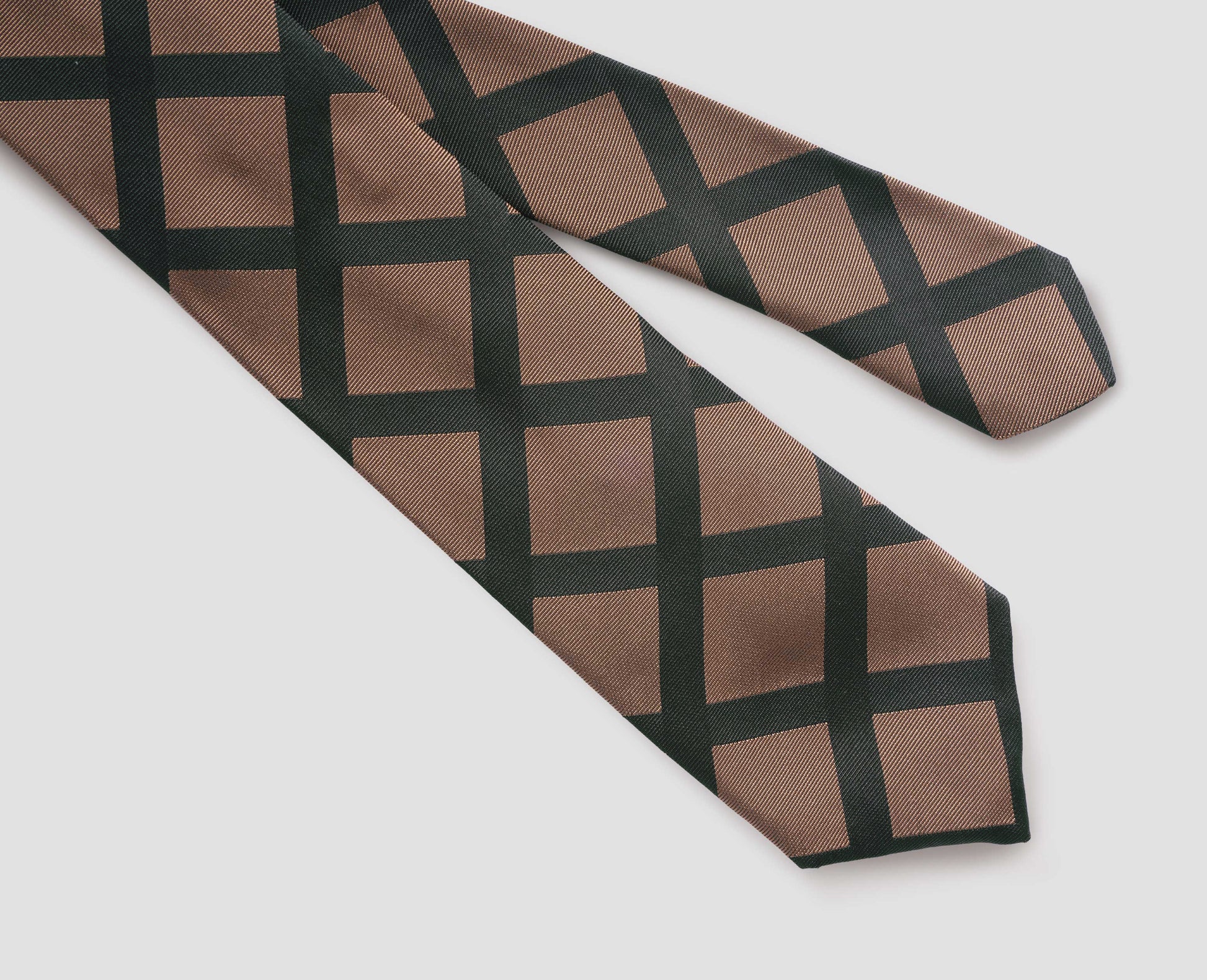 Beige and dark green bold check silk tie fabric swatch.