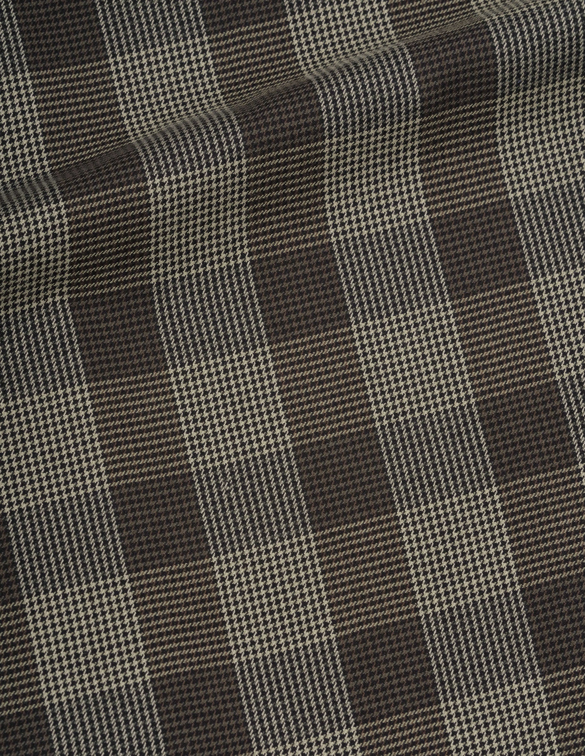 Black, brown and green graphic yarn dyed wool shirt, fabric swatch.