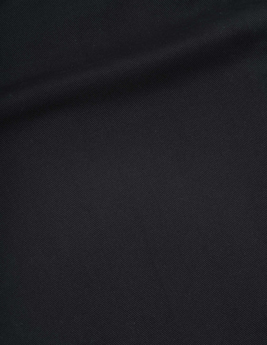 Black trousers, heavy cotton drill fabric swatch.