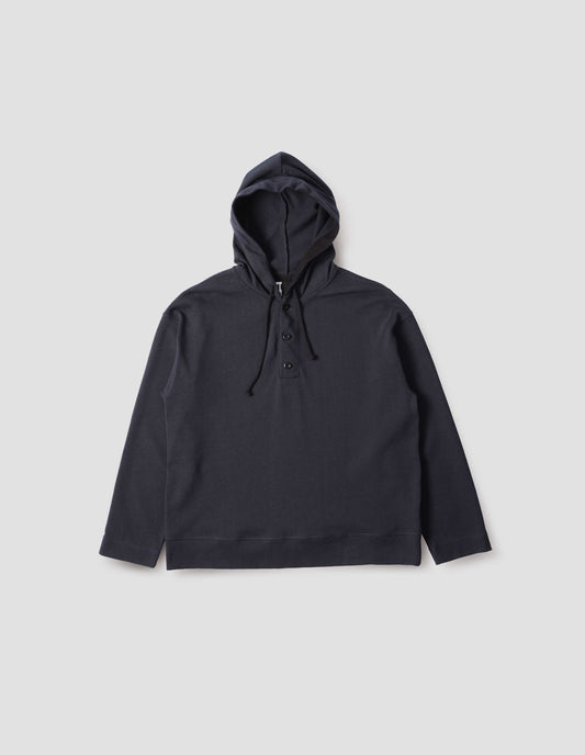 Blue black cotton hoodie, with drawcord hood, herringbone tape detailing, straight cuffs and stitch seam detailing, front flat lay view.