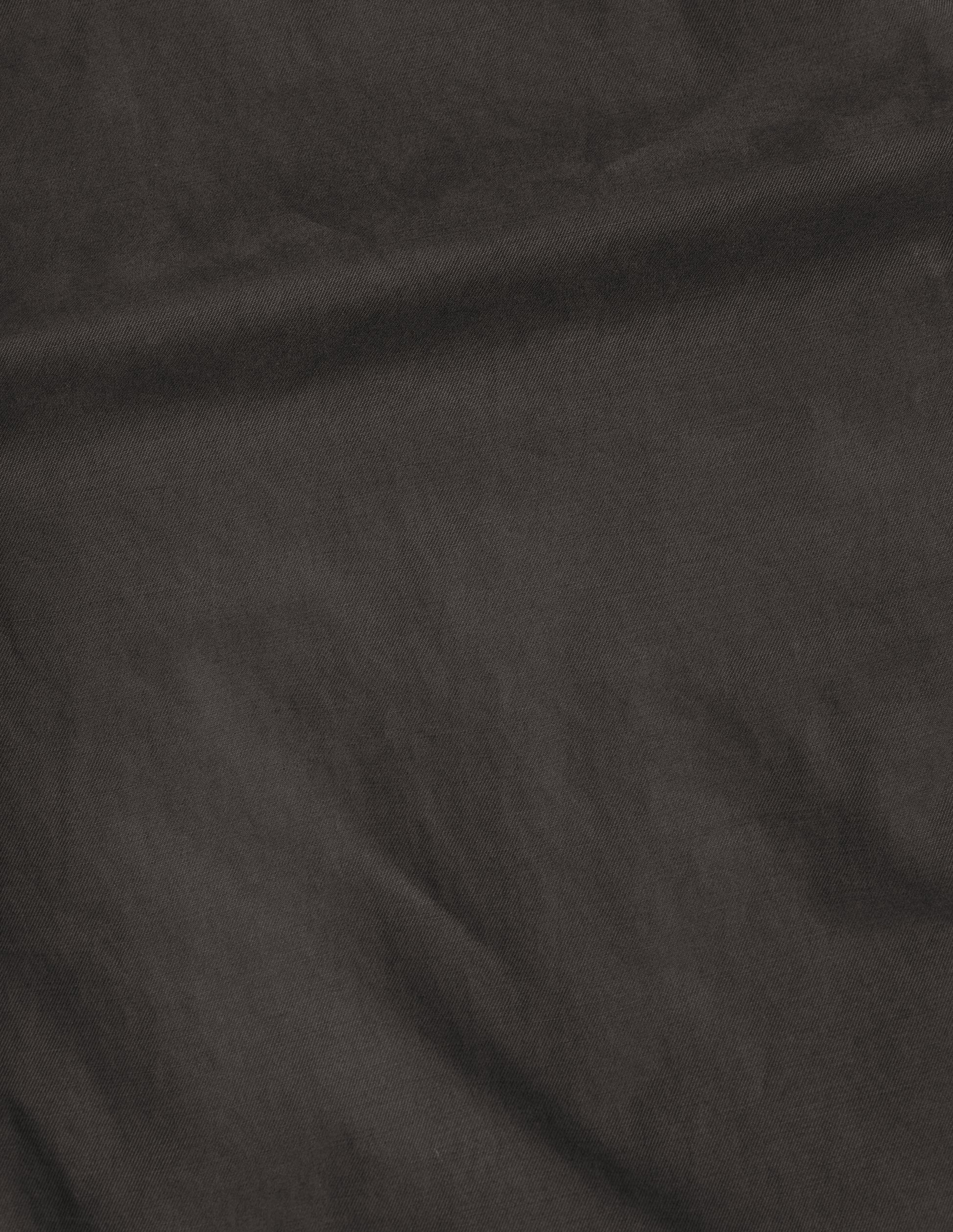 Brown plain cotton drill trousers, fabric swatch.