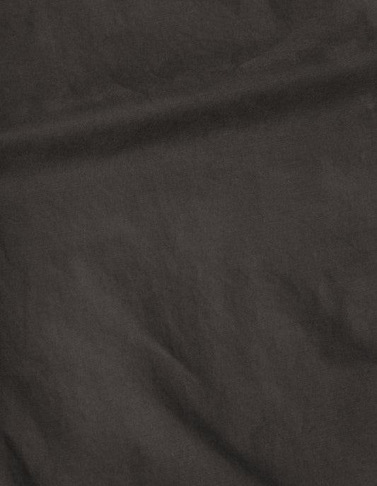 Brown plain cotton drill trousers, fabric swatch.