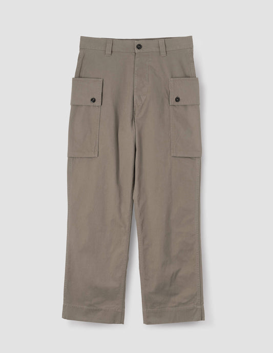 Beige cargo trousers with deep flap button fastening patch pocket, concealed hand pockets, belt loops and deep stitch hem. Front flat lay view.