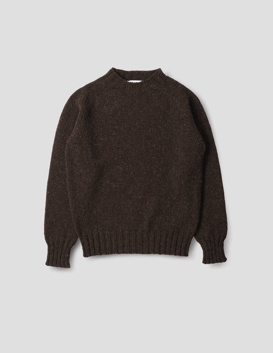 Dark brown marl jumper with saddle sleeves and contrasting rib on neck, cuffs and hem. Front flat lay view. 