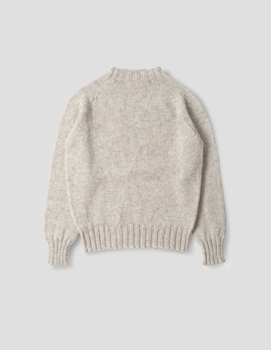 Beige marl jumper with saddle sleeves and contrasting rib on neck, cuffs and hem. Back flat lay view. 