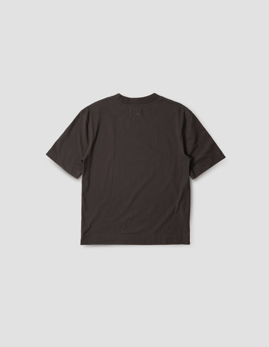Dark red brown t-shirt, with rib neck and flatlock stitch detailing on seams, back flat lay view.