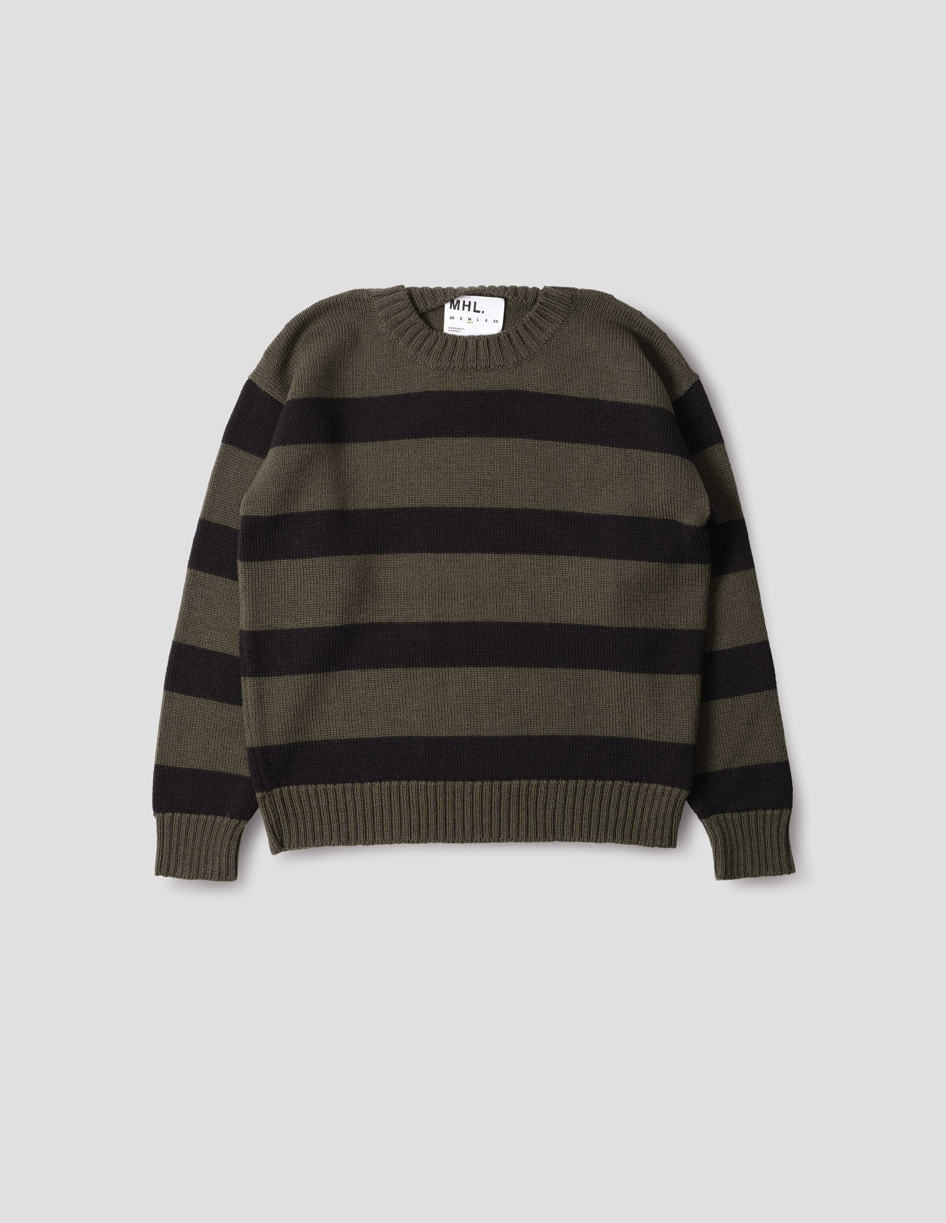 Green and black striped wool jumper, with ribbed neck, cuffs and hem. Front flat lay view. 