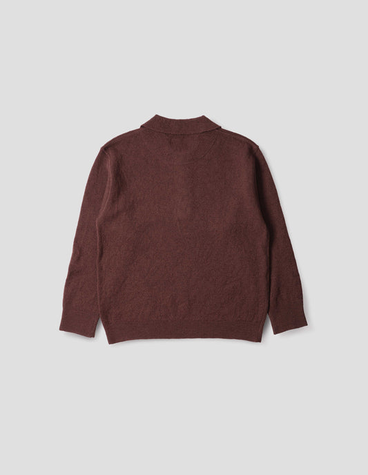 Brown knitted polo with contrast rib on neck, cuffs and hem. Back flat lay view.