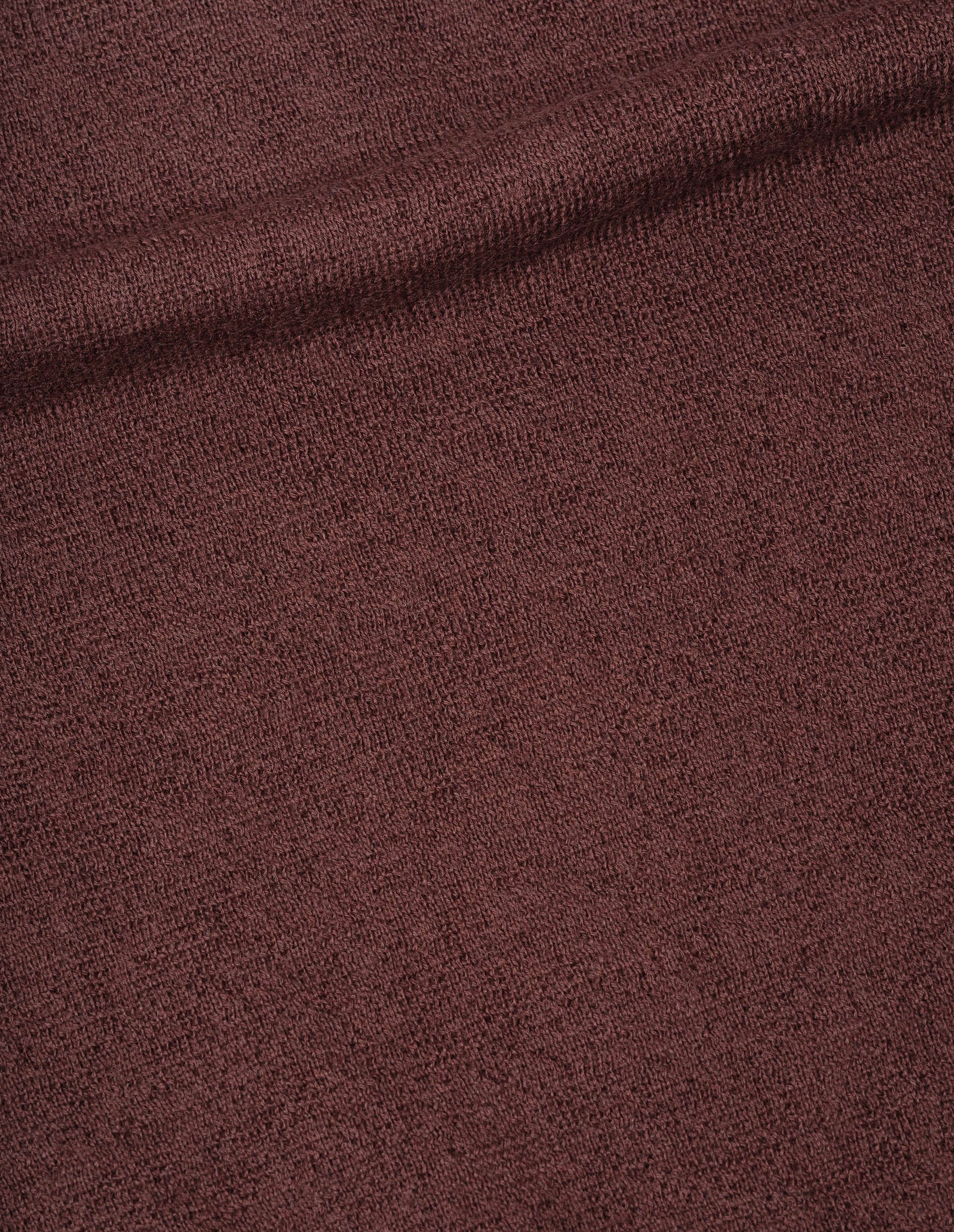 Brown dry wool knitted polo, fabric swatch.