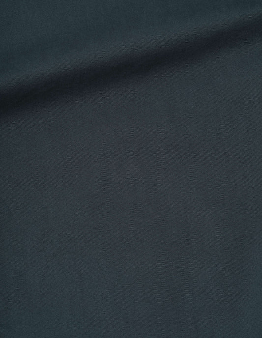 Blue double twisted cotton canvas trousers fabric swatch.