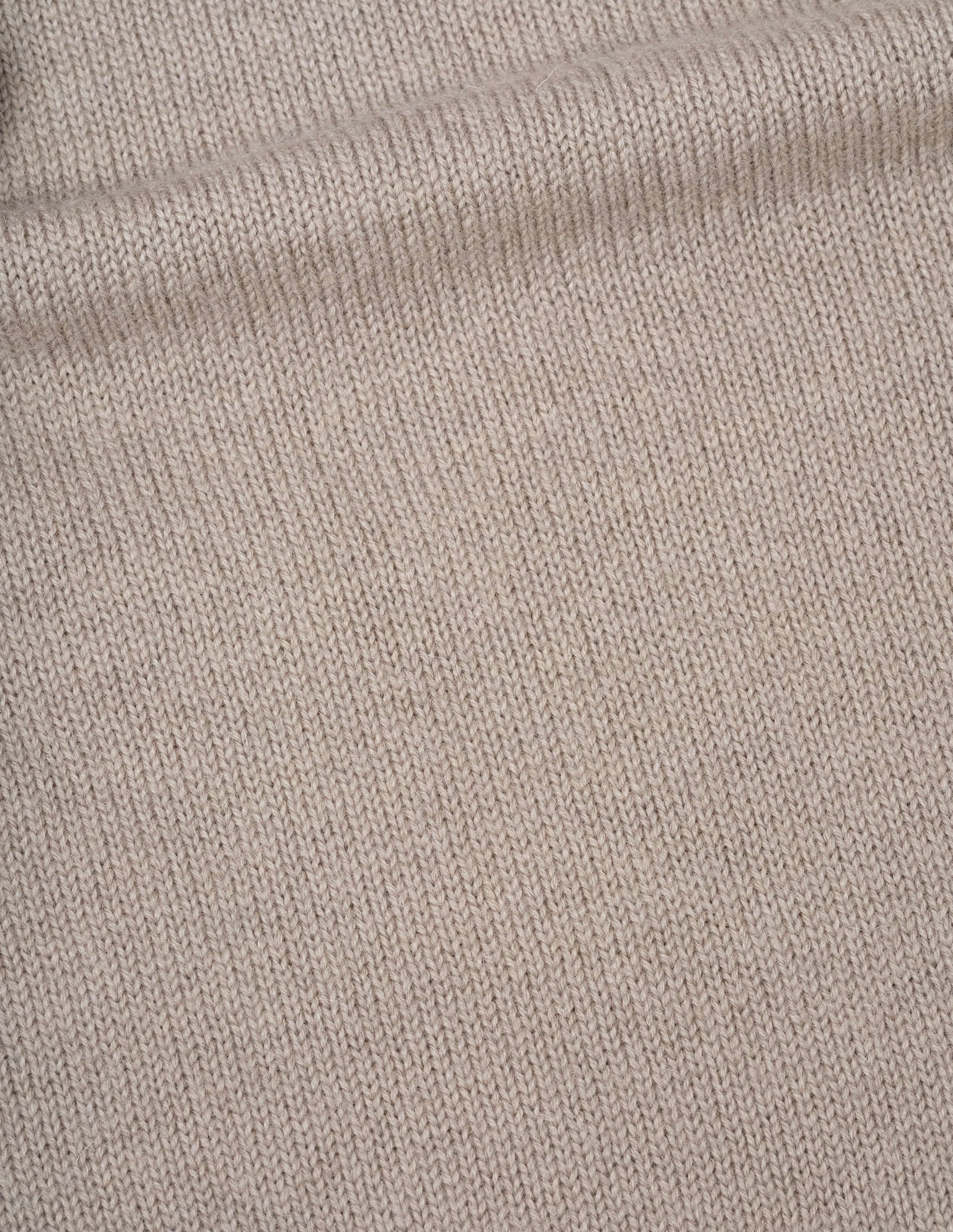 Beige roll neck jumper dry merino, fabric swatch.