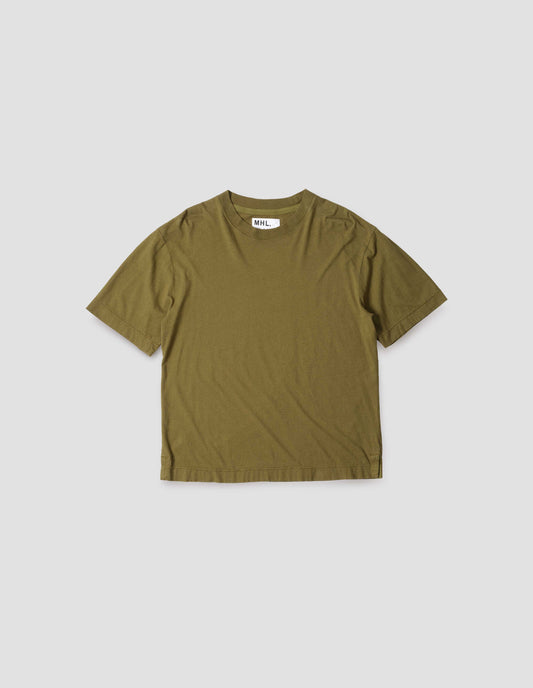 Green cotton t-shirt, with herringbone tape detailing on inside neck and vent split hem, front flat lay view.