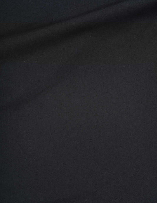 Black trousers, compact cotton canvas fabric swatch. 