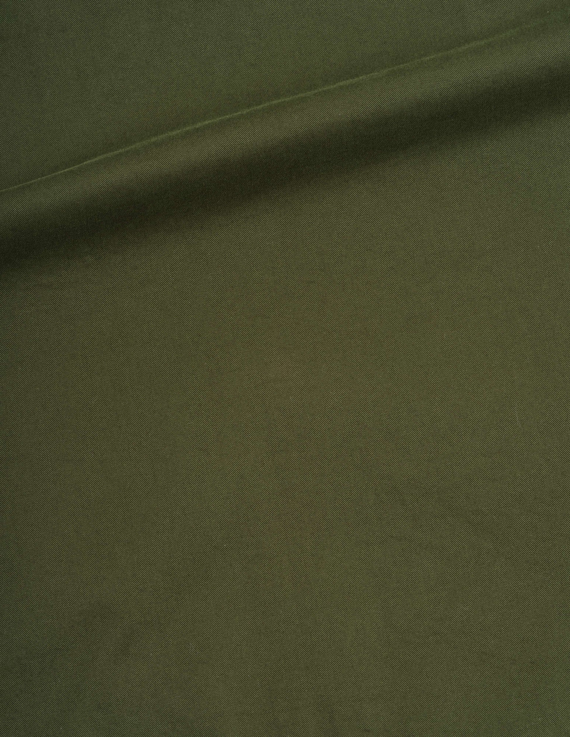 Green brushed cotton twill shirt fabric swatch.