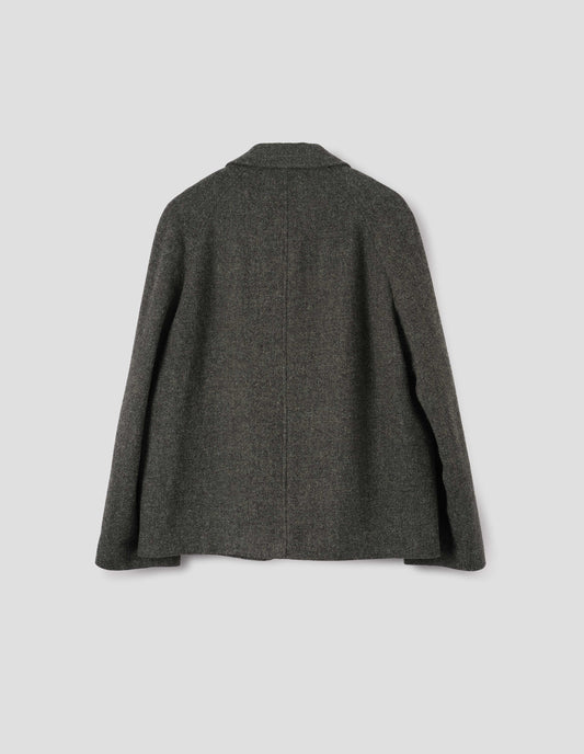 Dark grey harris tweed wool blazer with high collar fastening and raglan sleeve. Back flat lay view. 