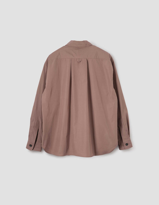 Dark pink shirt with hanger loop detail on back, split yoke and mother of pearl buttons on cuffs. Back flat lay view.