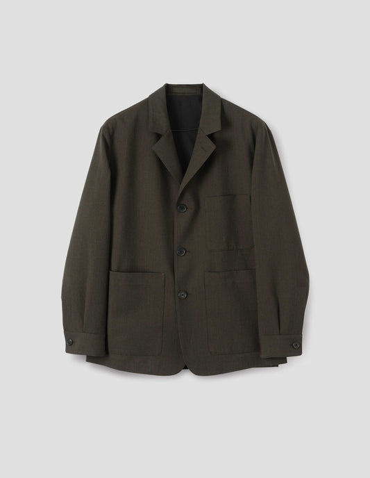 Brownish green wool blazer with horn button fastening, deep wrap closure, shirt cuff sleeves and patch pockets. Front flat lay view.