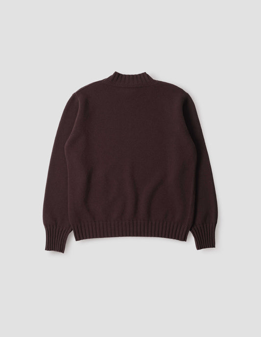 Dark brown ribbed crew neck jumper with ribbed cuffs and hem, back flat lay view.