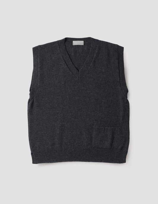 Charcoal grey sleeveless knitted jumper, with contrast rib on neck, armholes and hem, with pocket on lower hip, front flat lay view.
