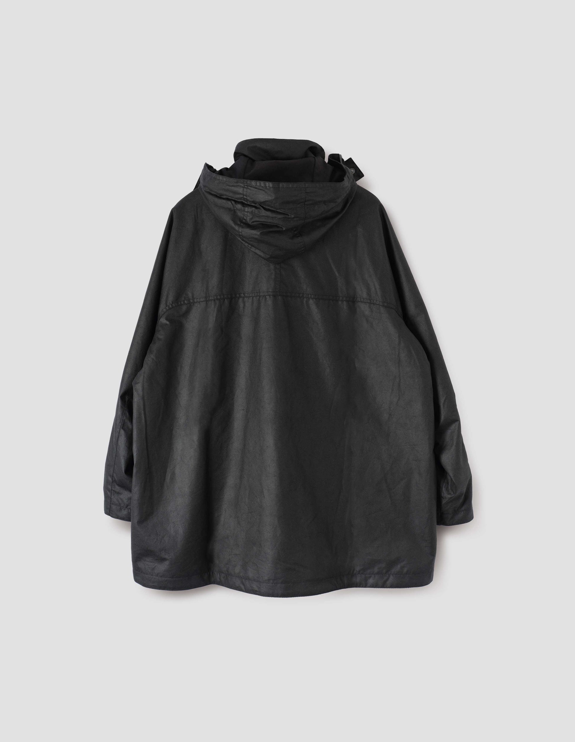 Black hooded parka with stand collar and raglan sleeve. Back flat lay view.