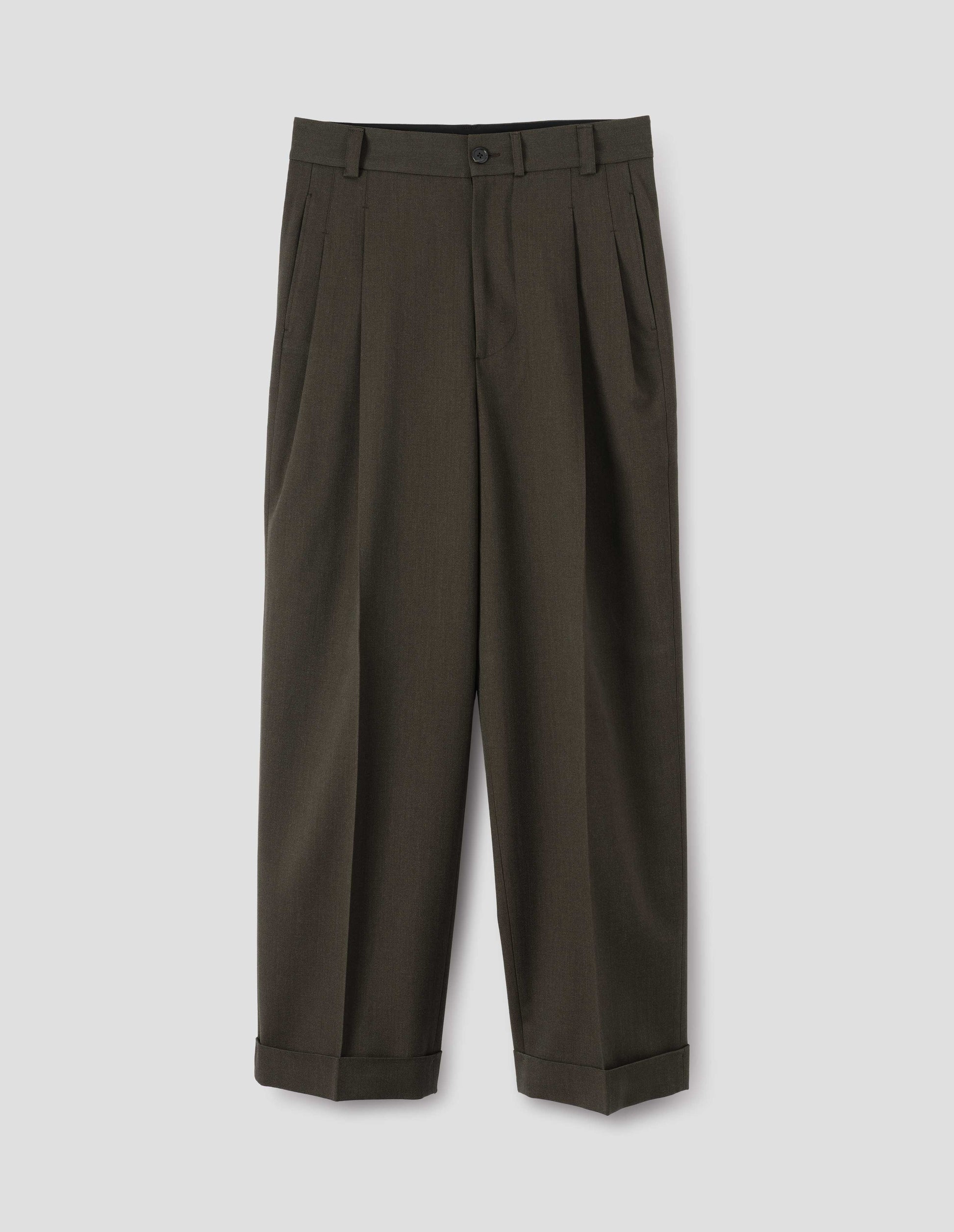 Brownish green wool trousers with deep double pleat, horn button waistband and zip closure, belt loops and concealed side pockets. Front flat lay view.