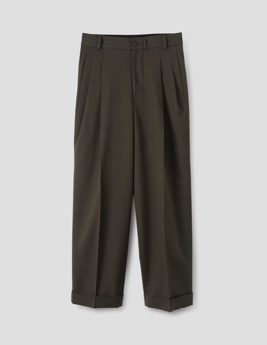 Brownish green wool trousers with deep double pleat, horn button waistband and zip closure, belt loops and concealed side pockets. Front flat lay view.