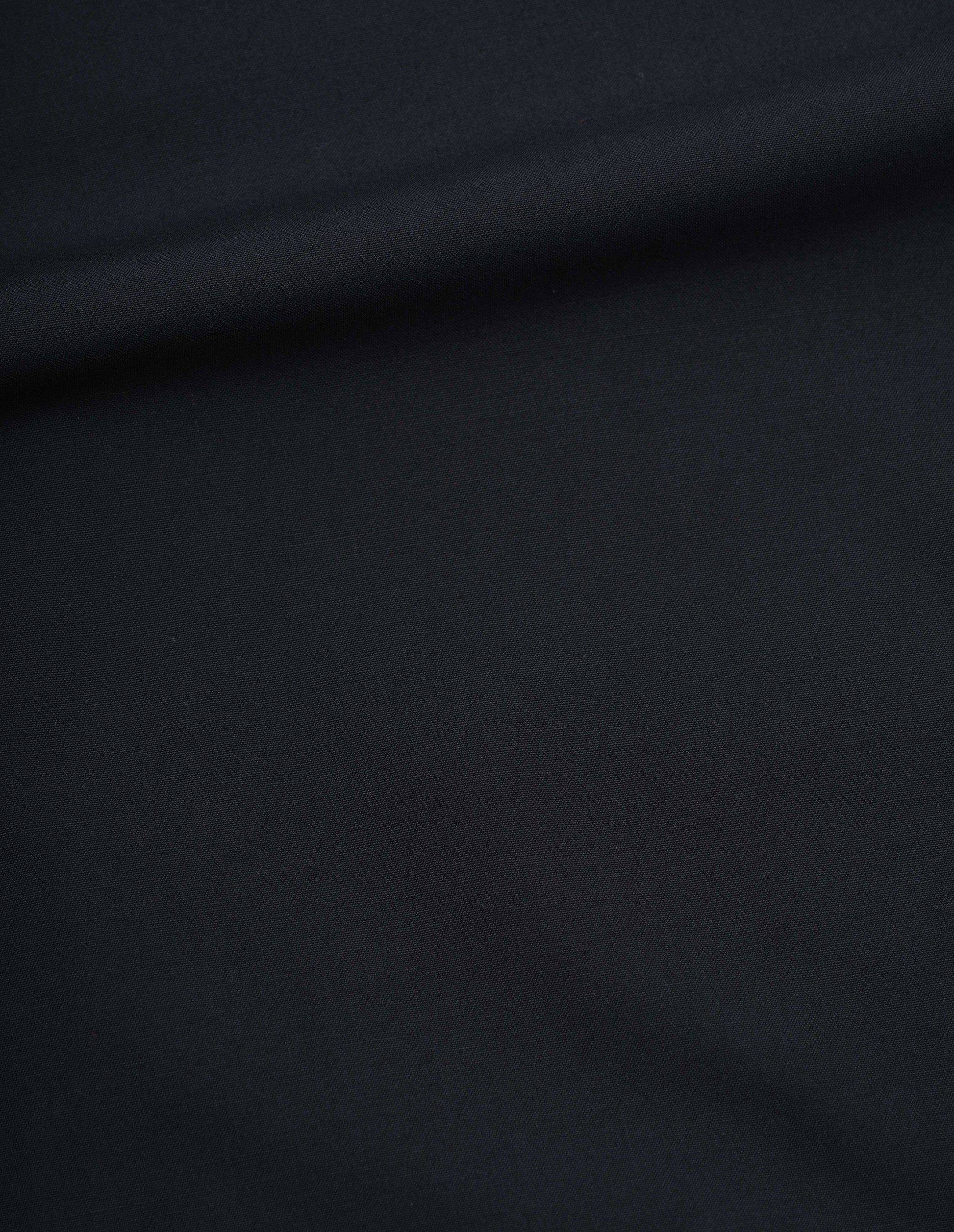 Black wool plainweave trousers, fabric swatch. 