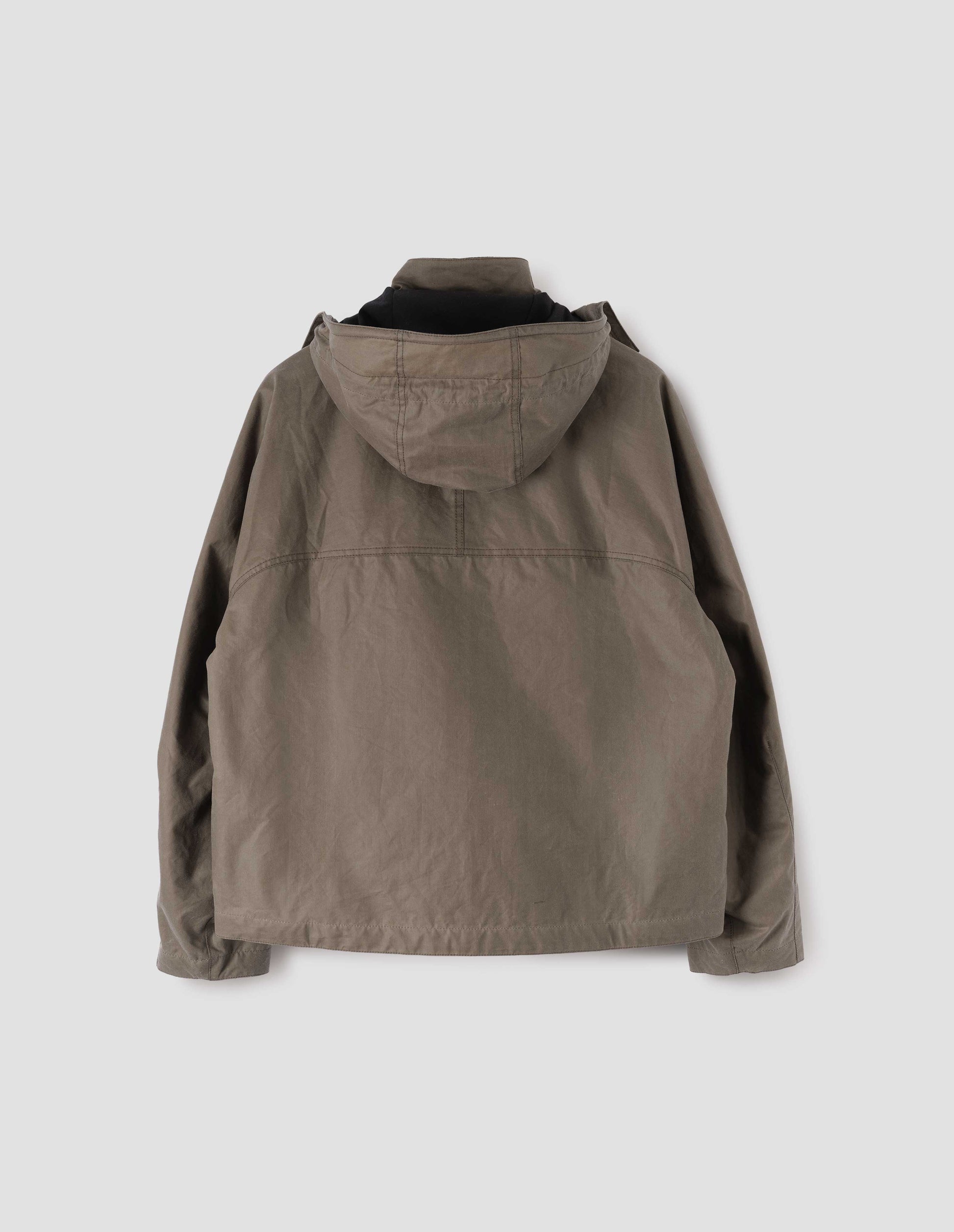 Dark beige boxy jacket with stand collar, hood and raglan sleeve. Back flat lay view.