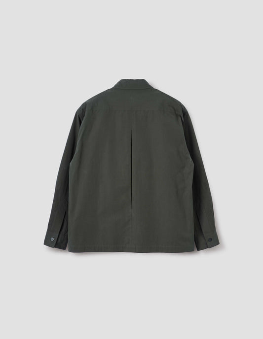 Dark green shirt with vent split hem, deep inverted pleat on back yoke and horn buttons on cuffs, back flat lay view.
 