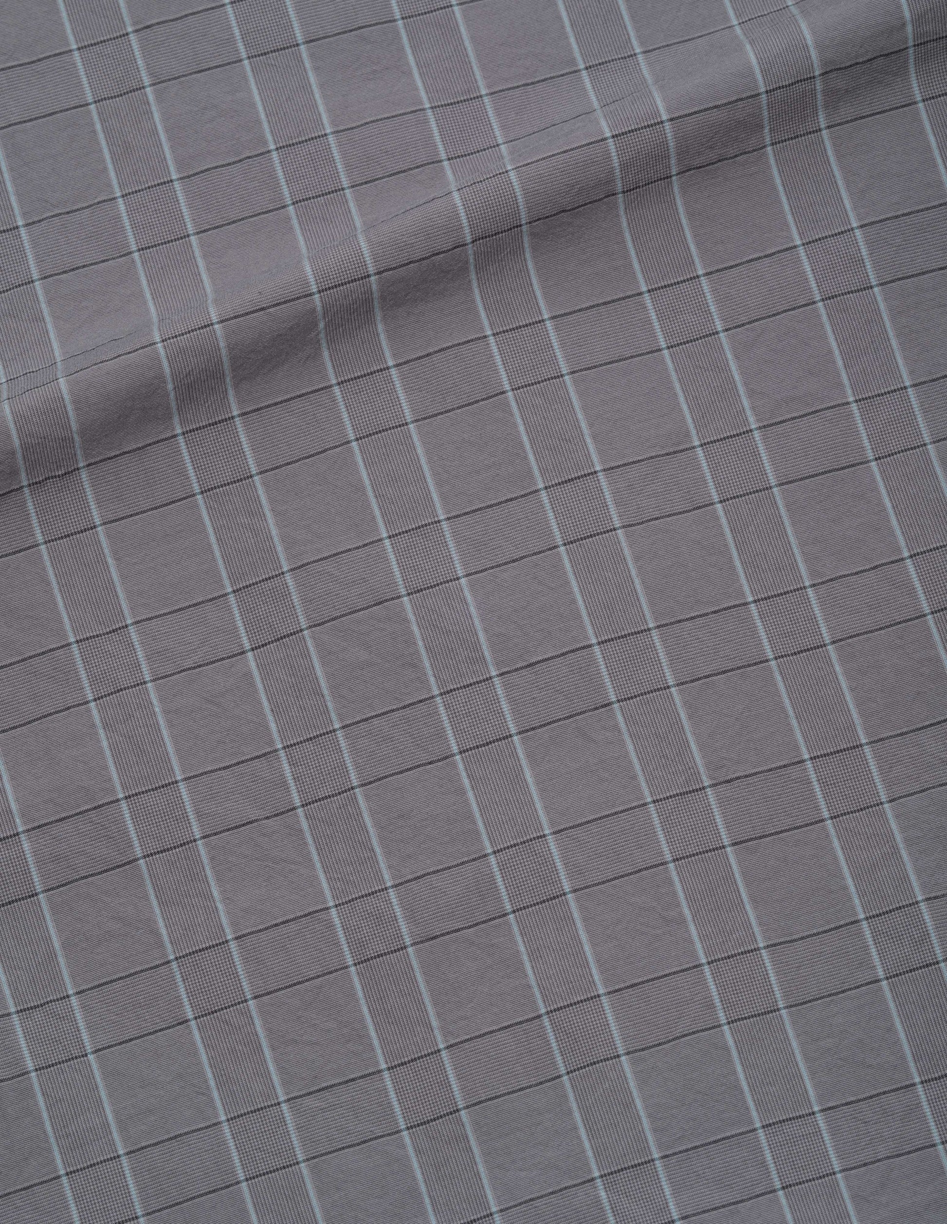 Grey with dark grey and light blue glen check cotton poplin shirt fabric swatch.