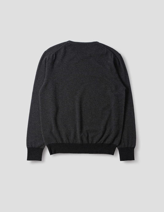 Dark grey merino cashmere jumper with black stripes, crew neck with tubular collar, and with contrast rib on cuffs and hem. Back flat lay view.