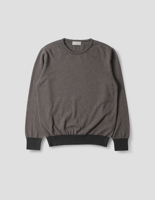 Grey merino cashmere jumper with dark grey stripes, crew neck with tubular collar, and with contrast rib on cuffs and hem. Front flat lay view.