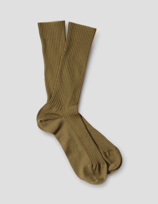 Yellowish green wool socks, ribbed, front flat lay view.