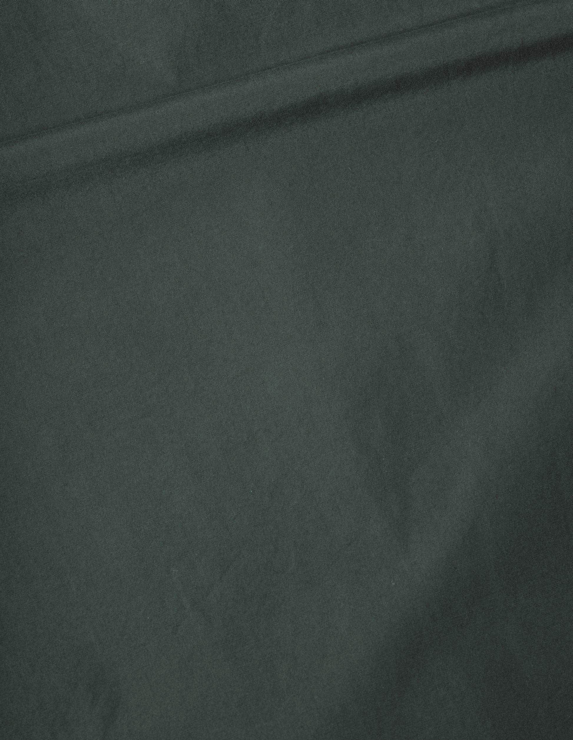 A relaxed dark grey cotton shirt, fabric swatch.