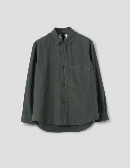 A relaxed dark grey cotton shirt with a raised placket, large chest pocket, side gusset stitch detailing and hanger loop detailing on inside collar. Front flat lay view.
