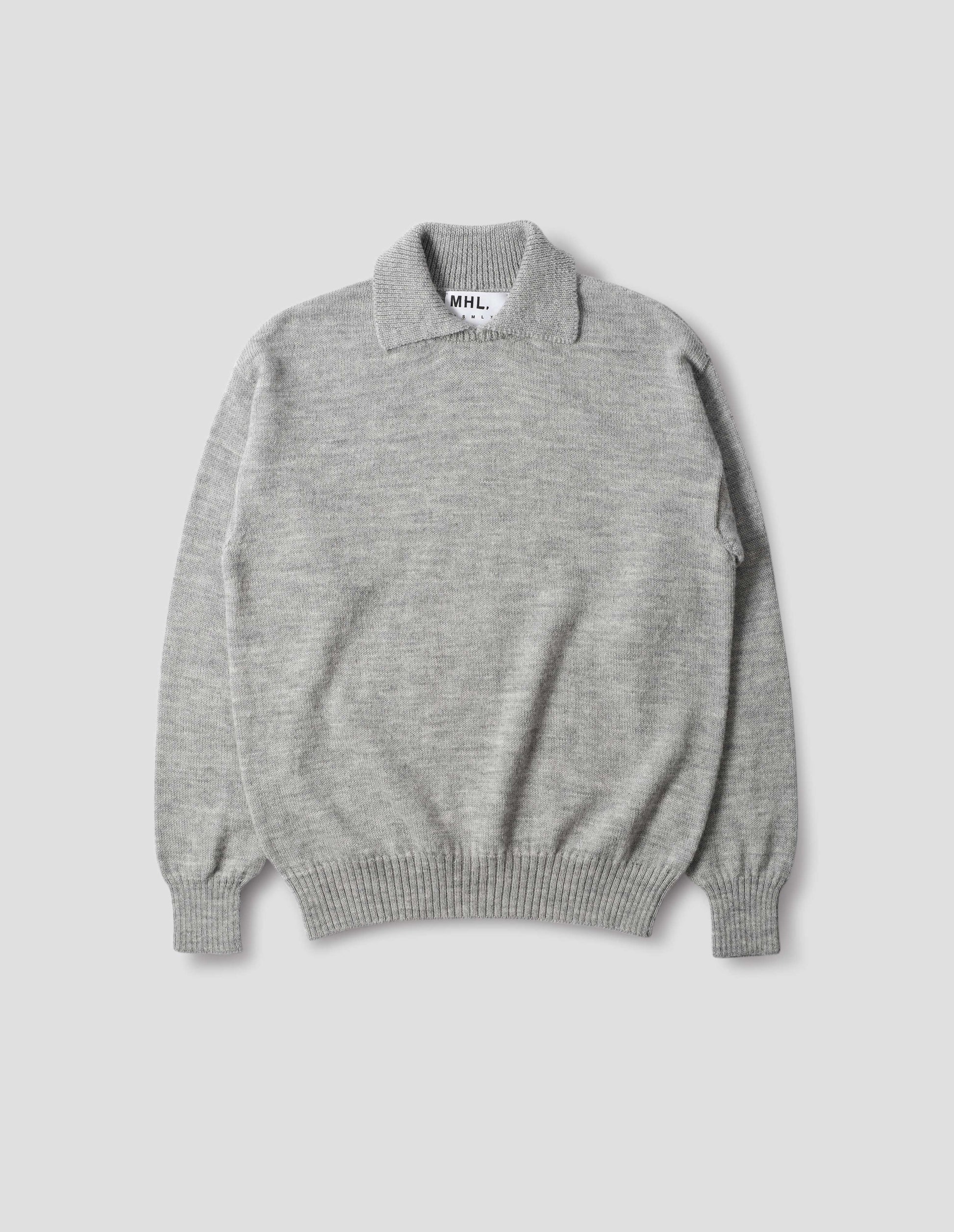 Collared wool sweater in light grey with a wide rib linked on collar, plain knit body, and deeper ribbed cuffs. Finished with a straight hem, front flat view.
