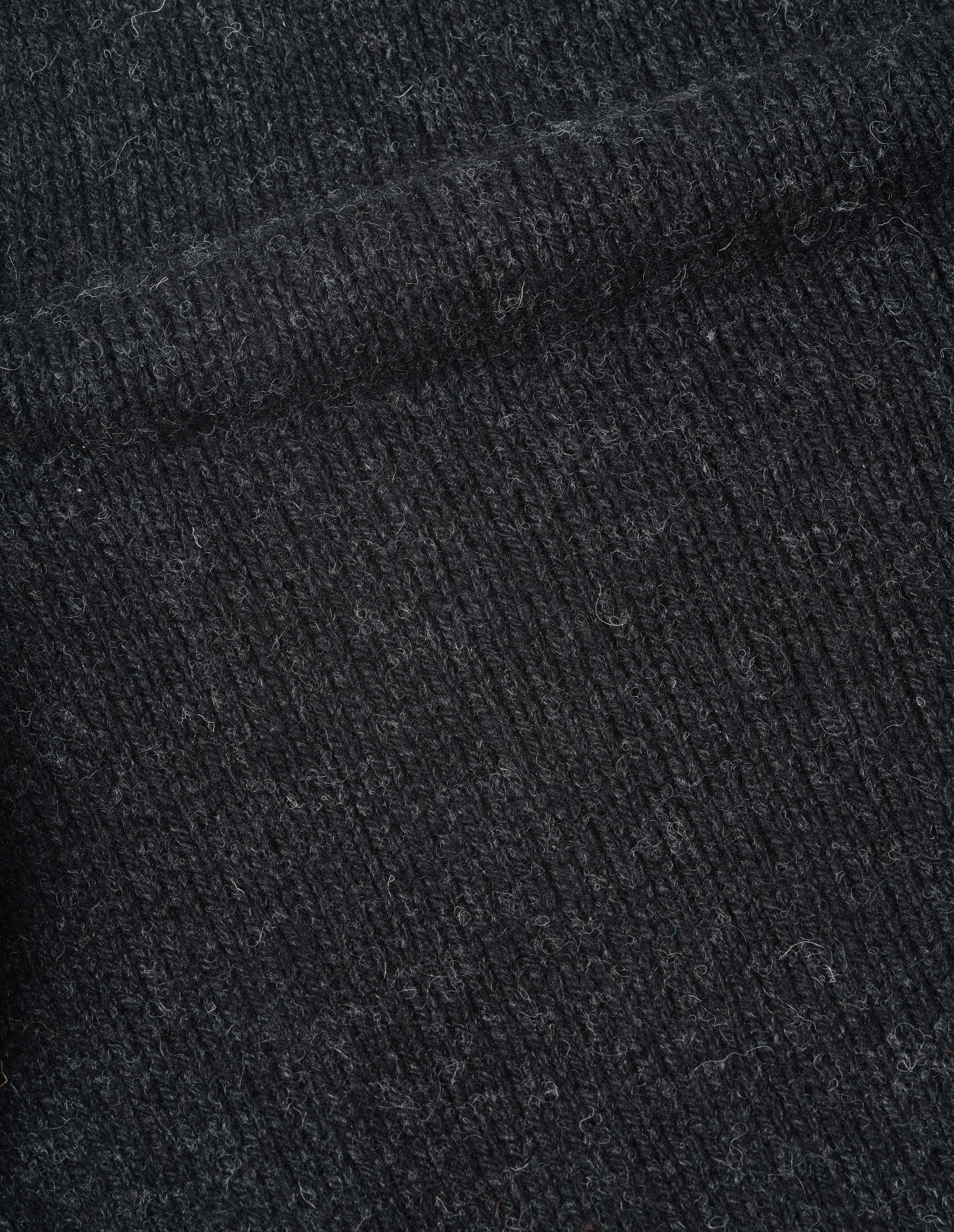 Dark grey rustic wool jumper, fabric swatch.