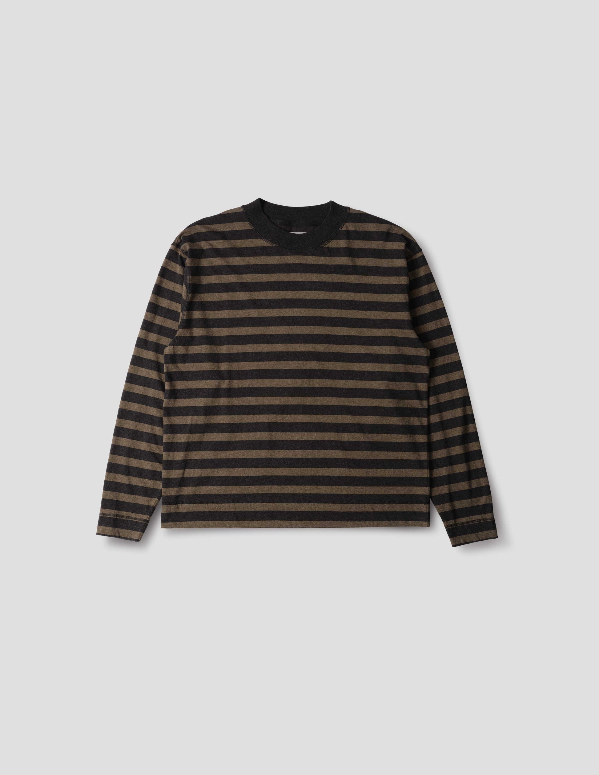 Black and brown stripe crew neck long sleeve jersey, rib trim on cuff and neck, flatlock stitch seam detailing. Front flat lay view.