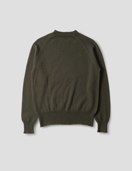 Dark green wool jumper, with raglan sleeve, rib collar, cuffs and hem, back flat lay view.