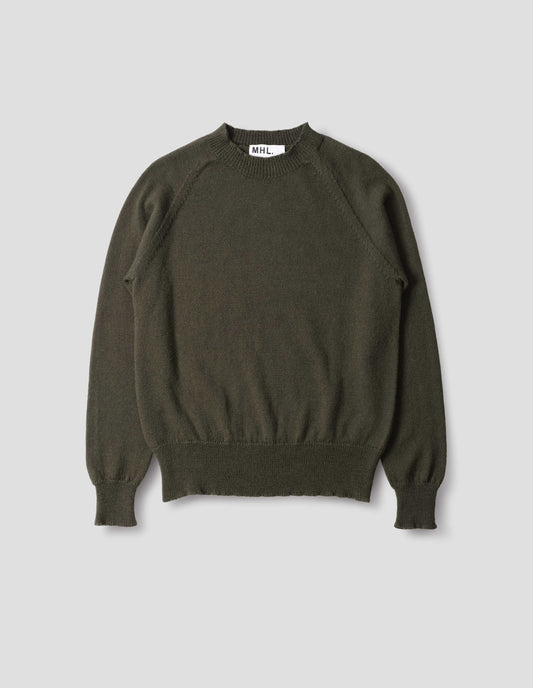 Dark green wool jumper, with raglan sleeve, rib collar, cuffs and hem, front flat lay view.
