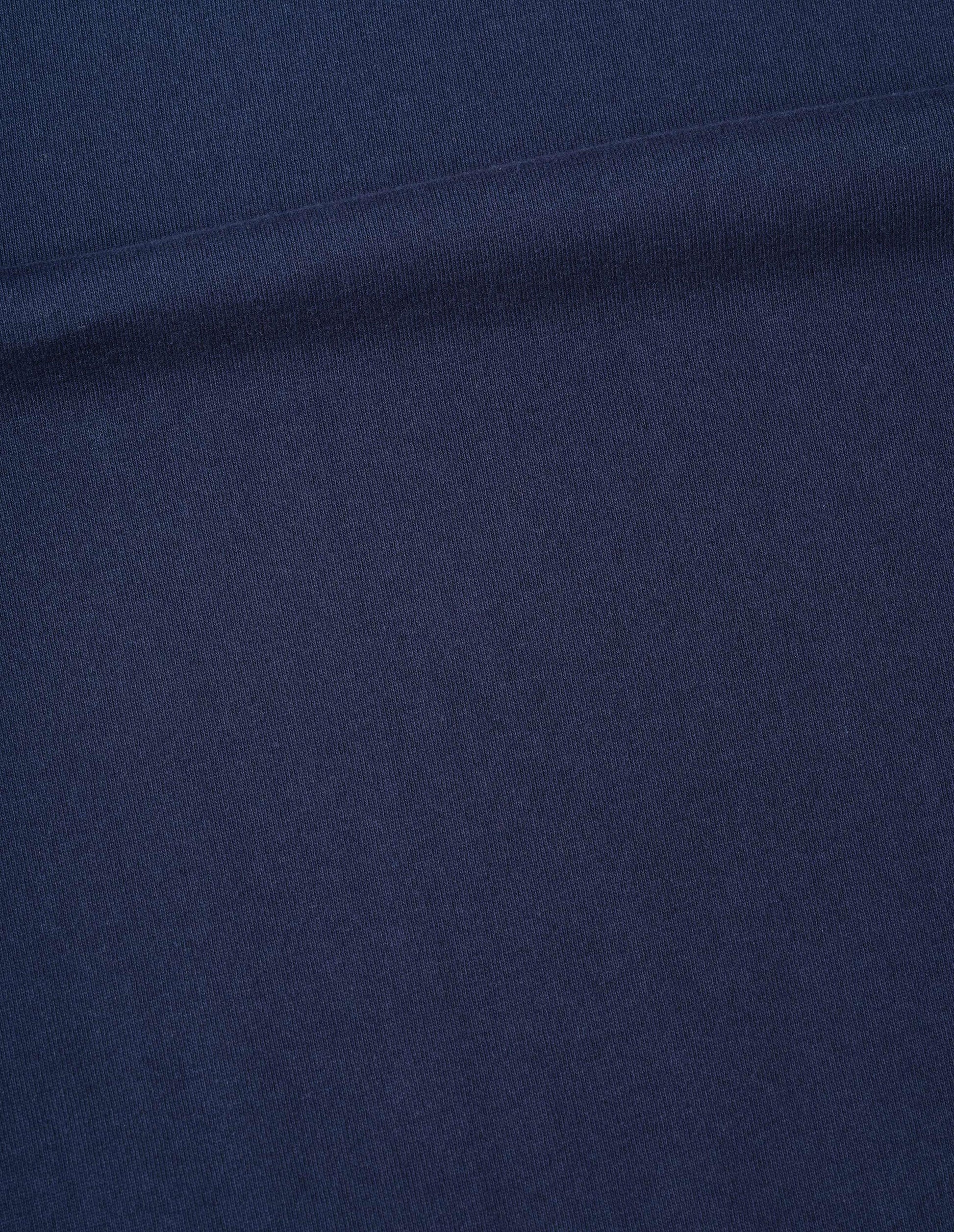 Blue matte jersey flatlock crew, fabric swatch.