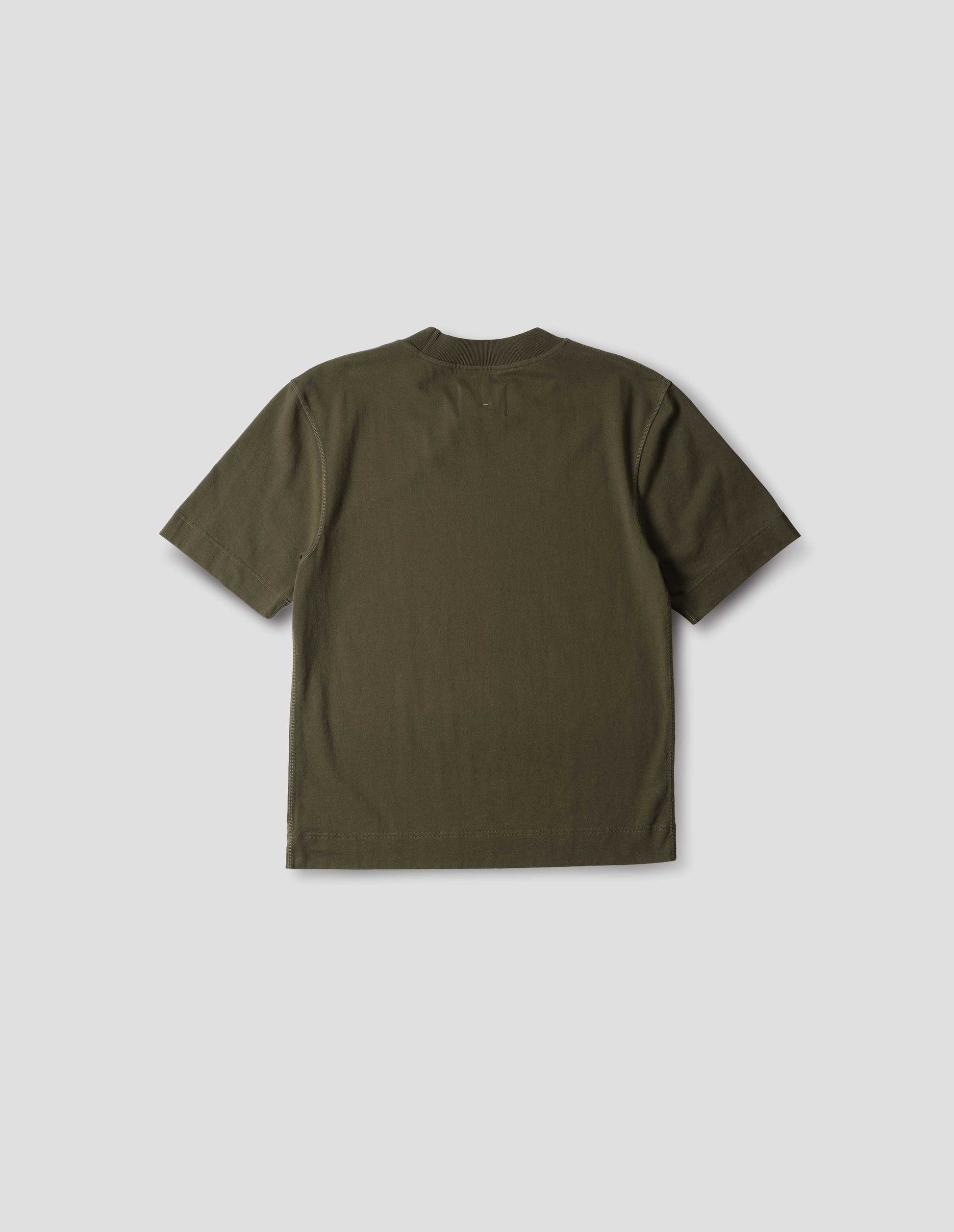 Green flatlock crew short sleeve T shirt, features a rib neck and flatlock stitch detailing on the seams, back flat lay view.