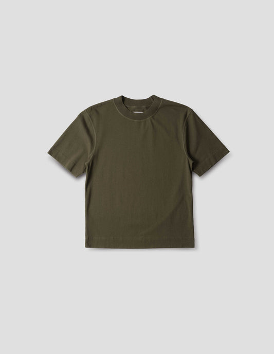 Green flatlock crew short sleeve T shirt, features a rib neck and flatlock stitch detailing on the seams, front flat lay view.